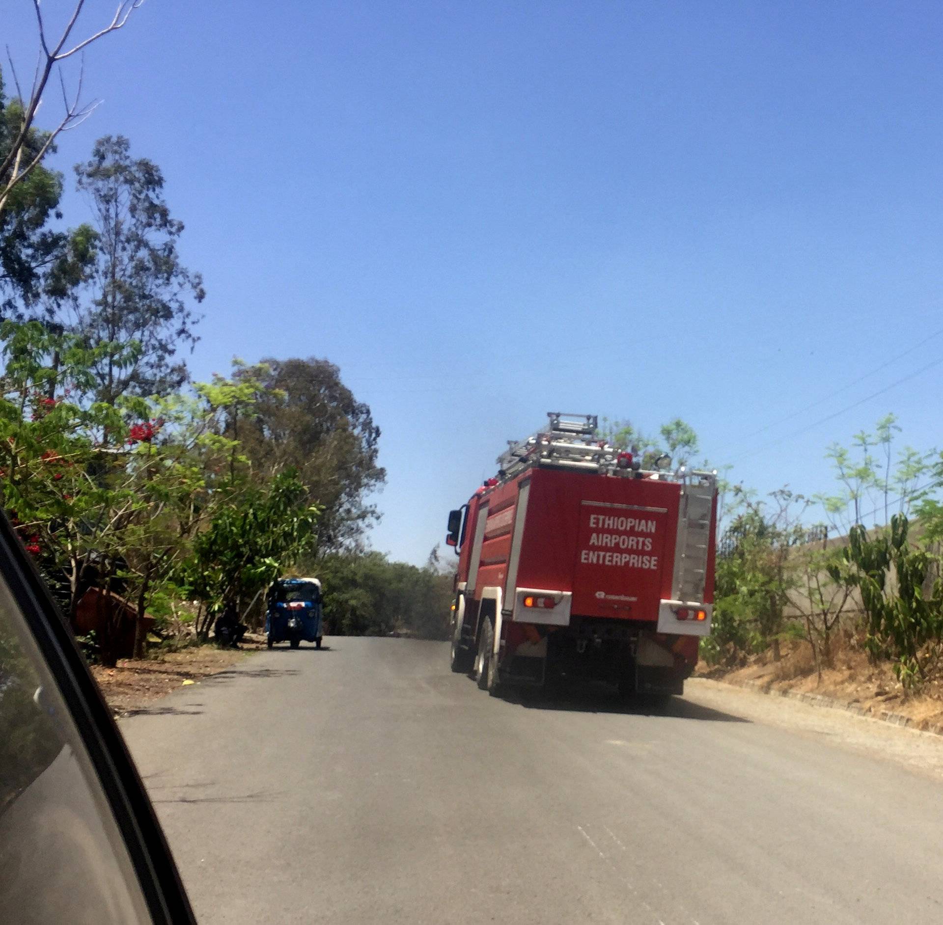 An Ethiopian Airports Enterprise fire engine drives to the scene of the Flight ET 302 plane crash, near the town of Bishoftu