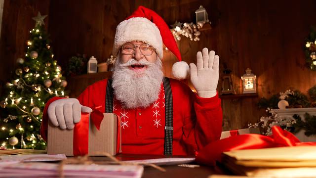 Happy,Santa,Claus,,Saint,Nicholas,Holding,Letter,Looking,To,Camera,