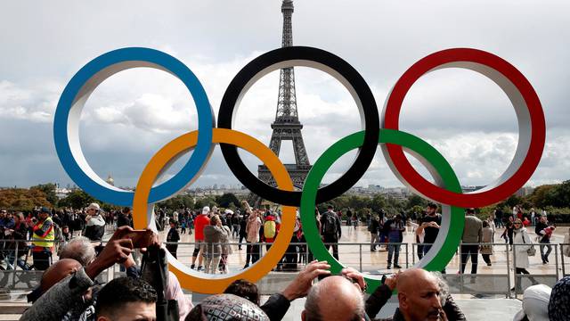 FILE PHOTO: Olympic rings to celebrate the IOC official announcement that Paris won the 2024 Olympic bid are seen in front of the Eiffel Tower at the Trocadero square in Paris