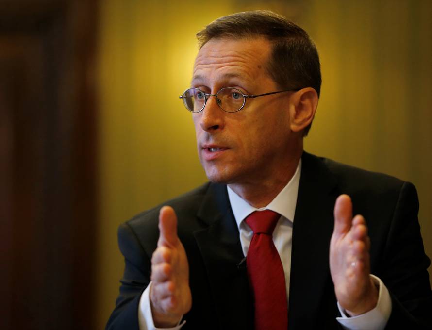 Varga attends an interview with Reuters in Budapest