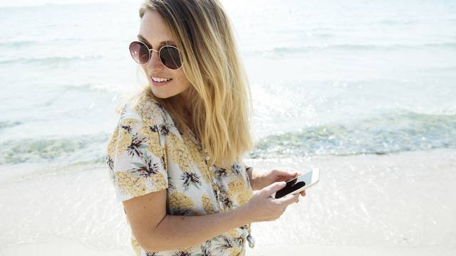 Woman smiling and chill out by the sea