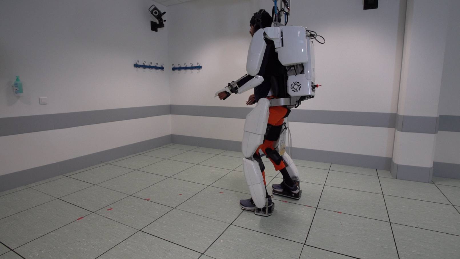 A patient with tetraplegia walks using an exoskeleton in Grenoble