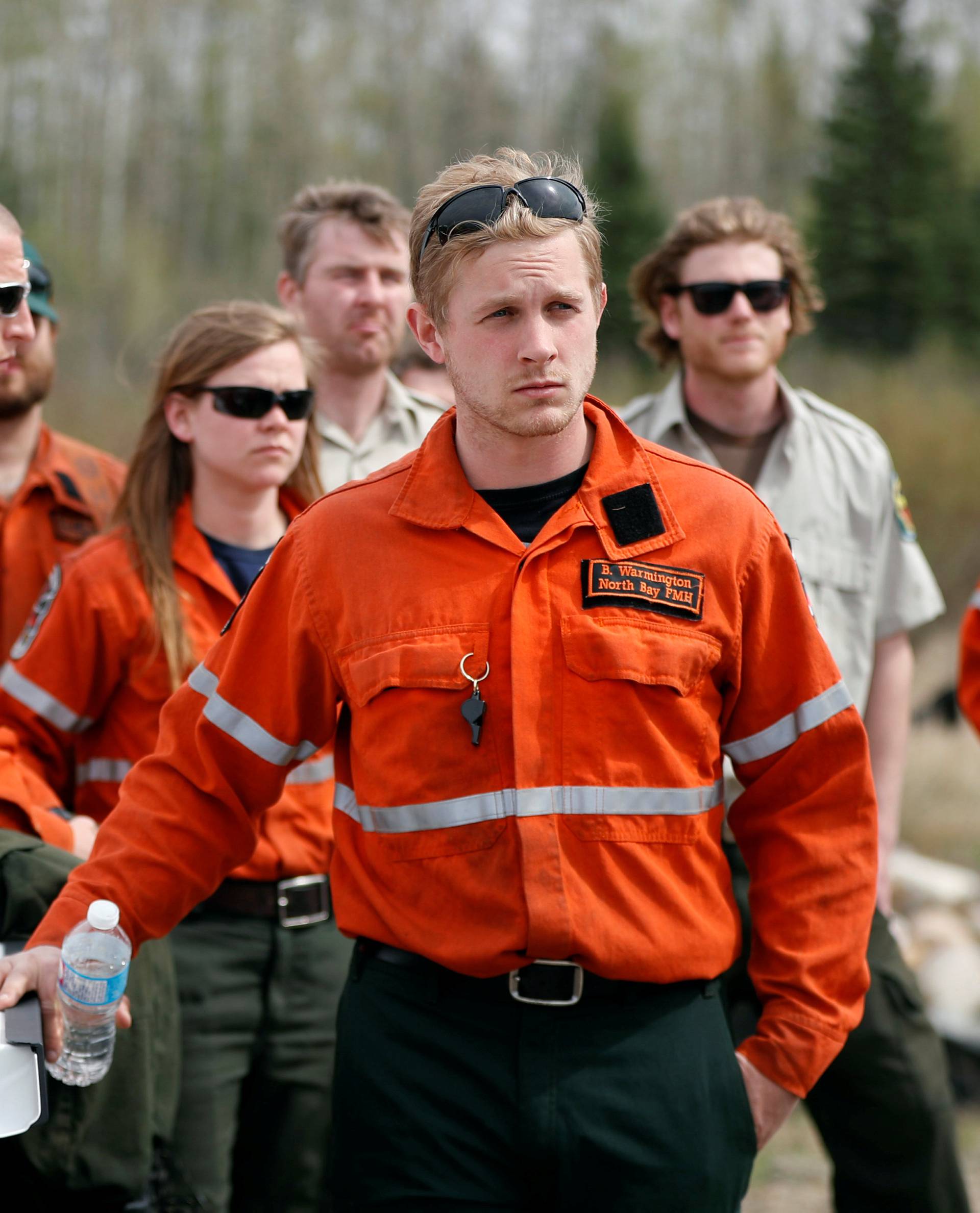 Ontario firefighters prepare to be deployed into wildfires as they receive orders near Fort McMurray