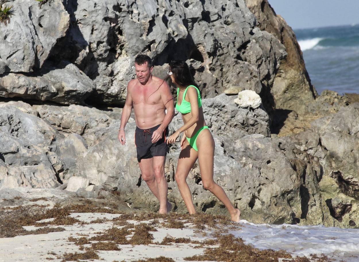 EXCLUSIVE: Soccer legend Lothar Matthäus is pictured on vacation in Mexico with a stunning brunette