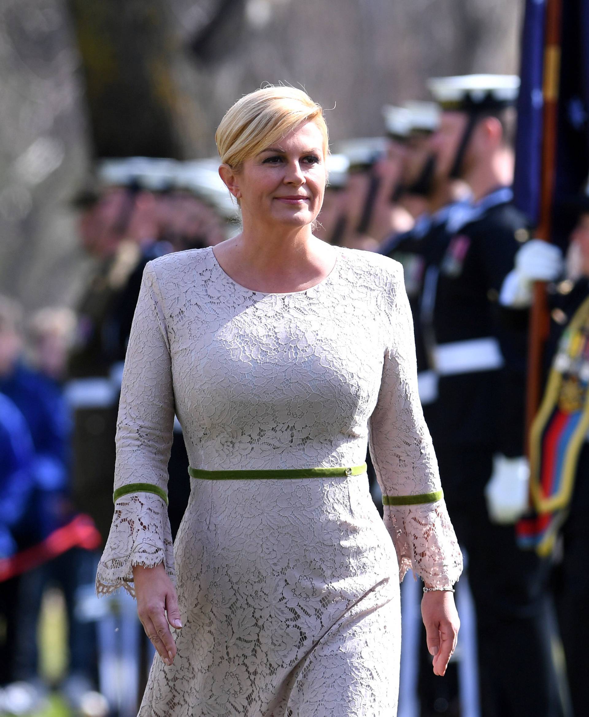 President of Croatia Kolinda Grabar-Kitarovic inspects an Australian military guard of honour during ceremonial welcome at Government House in Canberra