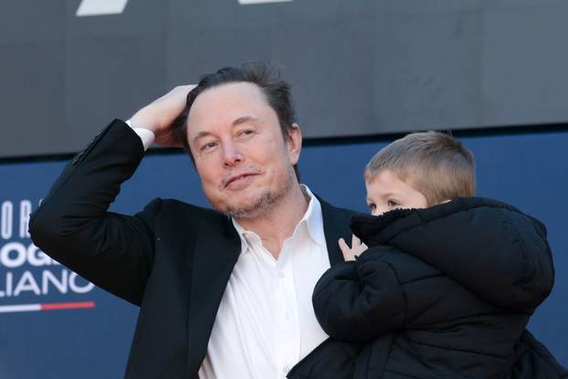 Italy, Rome: Atreju 2023, Giorgia Meloni's right-wing political festival. Elon Musk with his son