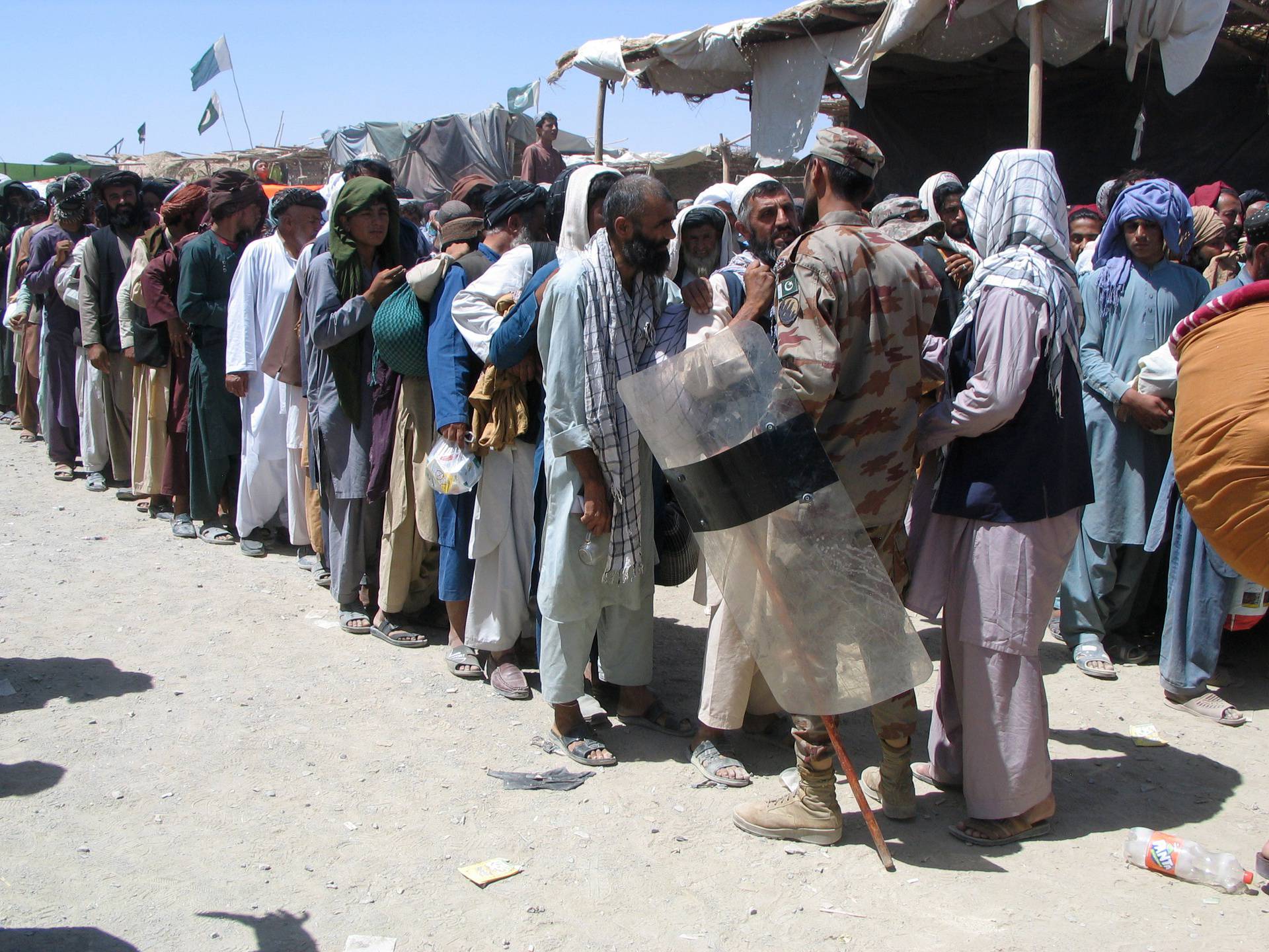 Pakistan Army soldiers control flow of people at Pakistan-Afghanistan border in Chaman