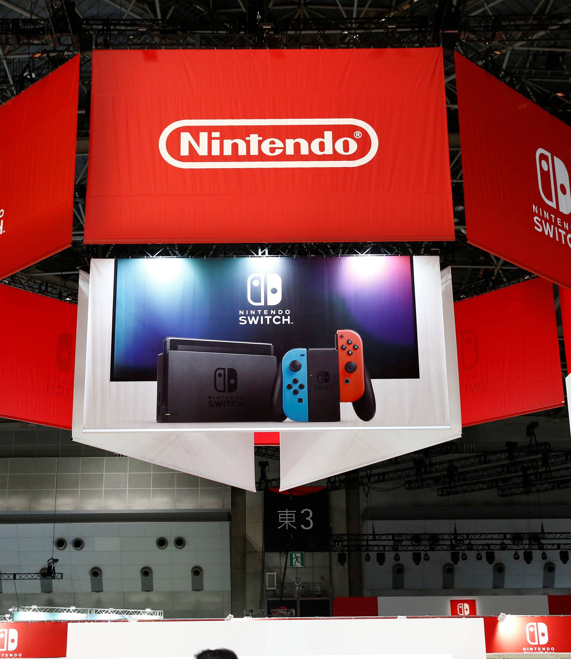 Banners of Nintendo's new game console Switch are pictured at its experience venue in Tokyo