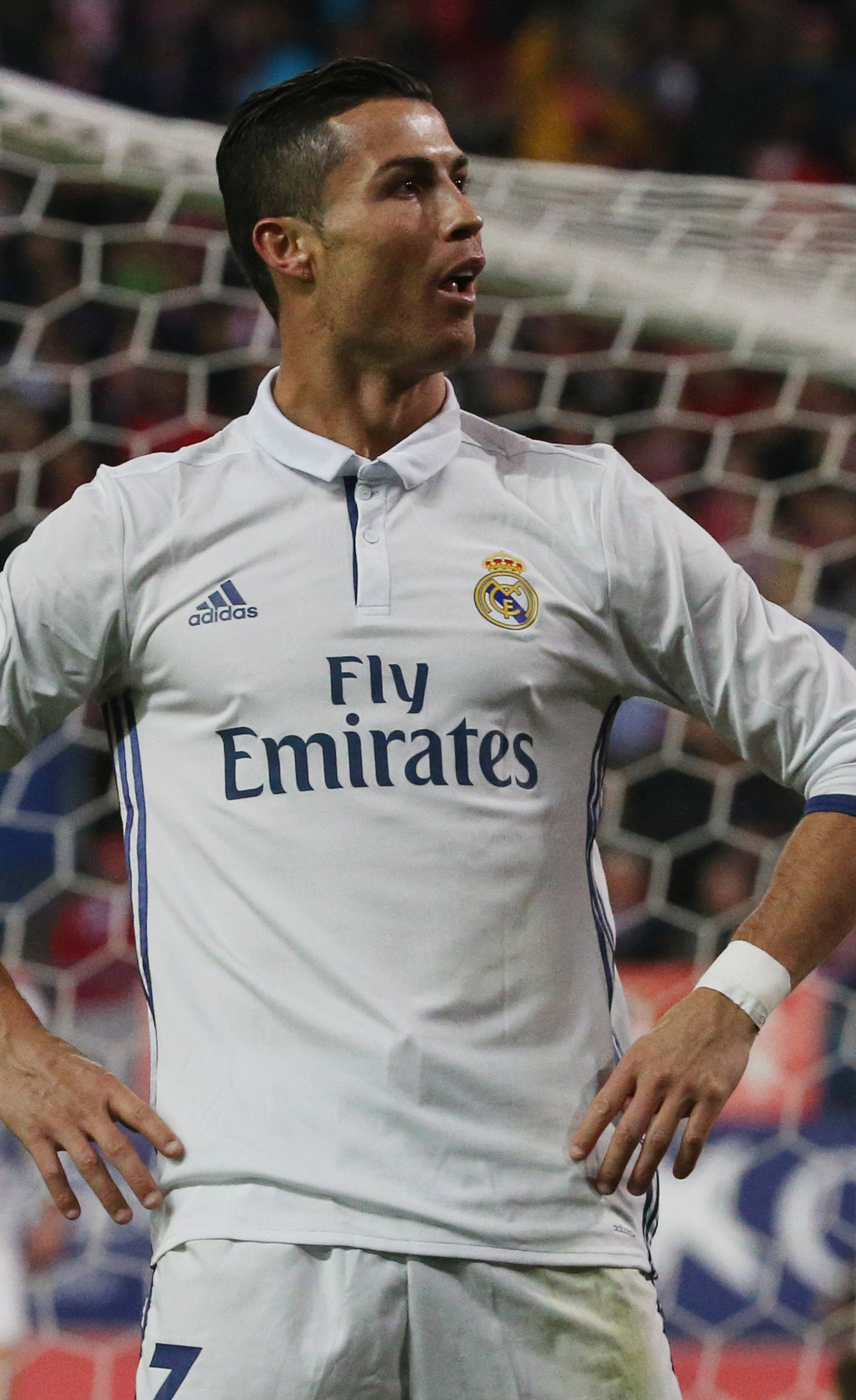 Real Madrid's Cristiano Ronaldo celebrates scoring their third goal and his to complete his hat trick