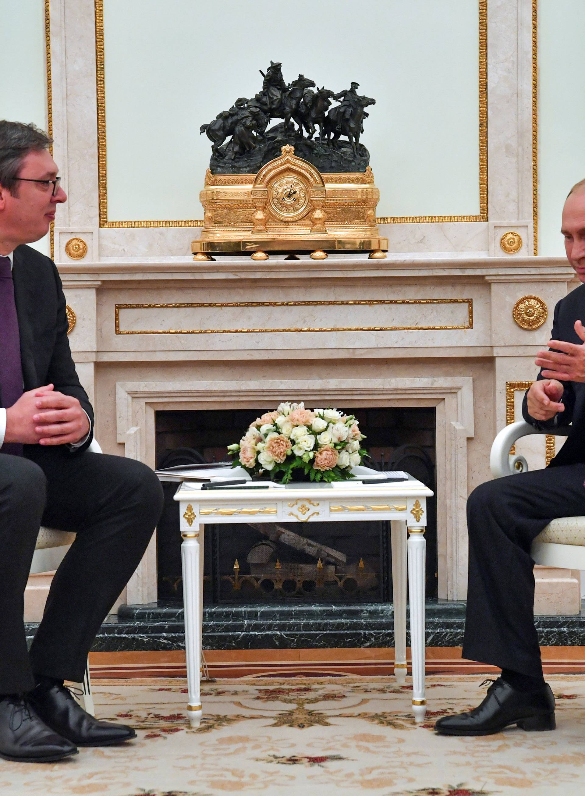 Russian President Putin meets with his Serbian counterpart Vucic in Moscow