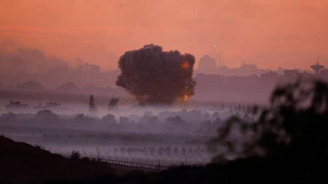 Smoke rises after Israeli air strikes in Gaza, as seen from southern Israel