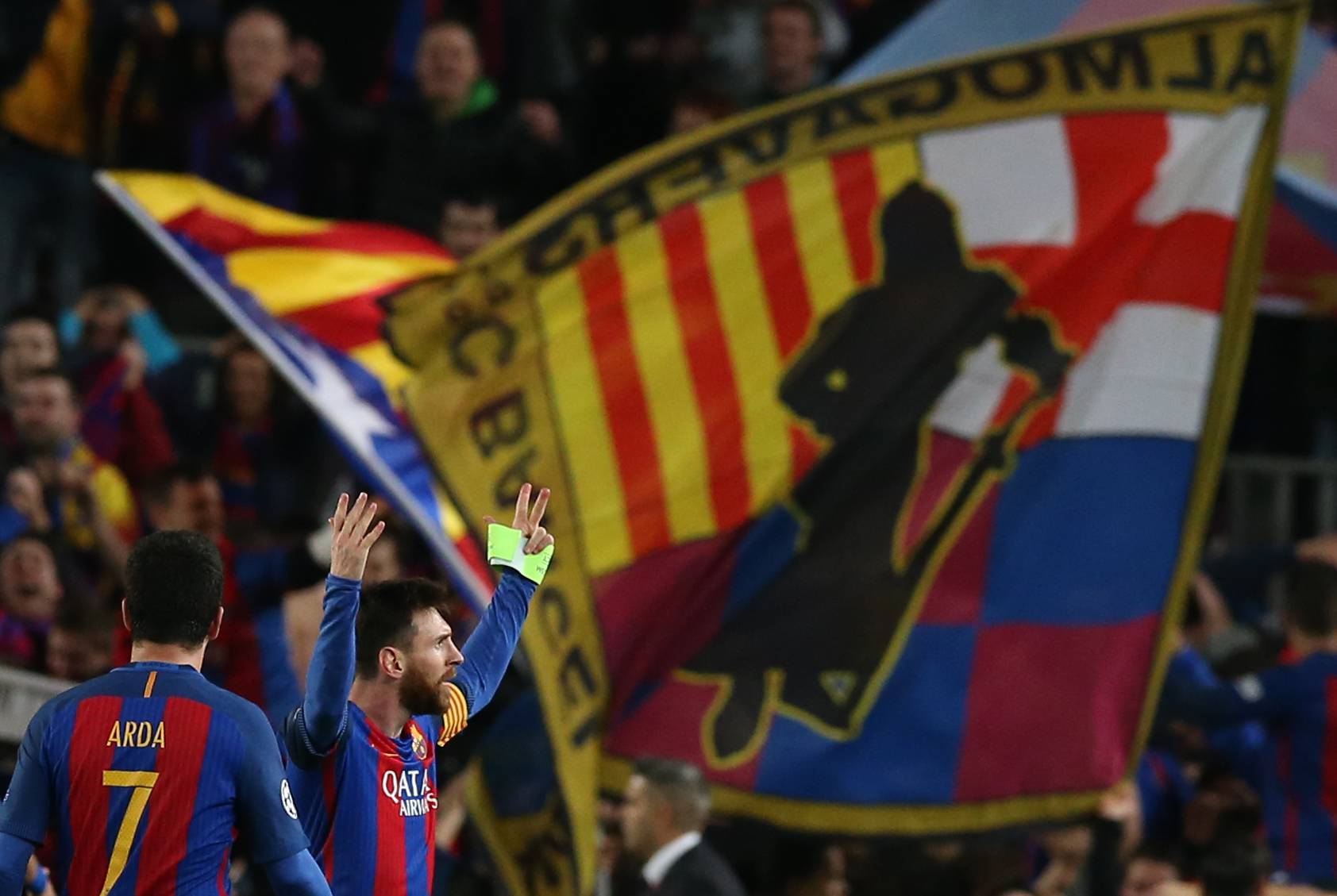Barcelona's Lionel Messi celebrates after the game