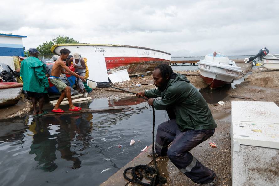 Jamaicans make preparations ahead of the arrival of Hurricane Melissa