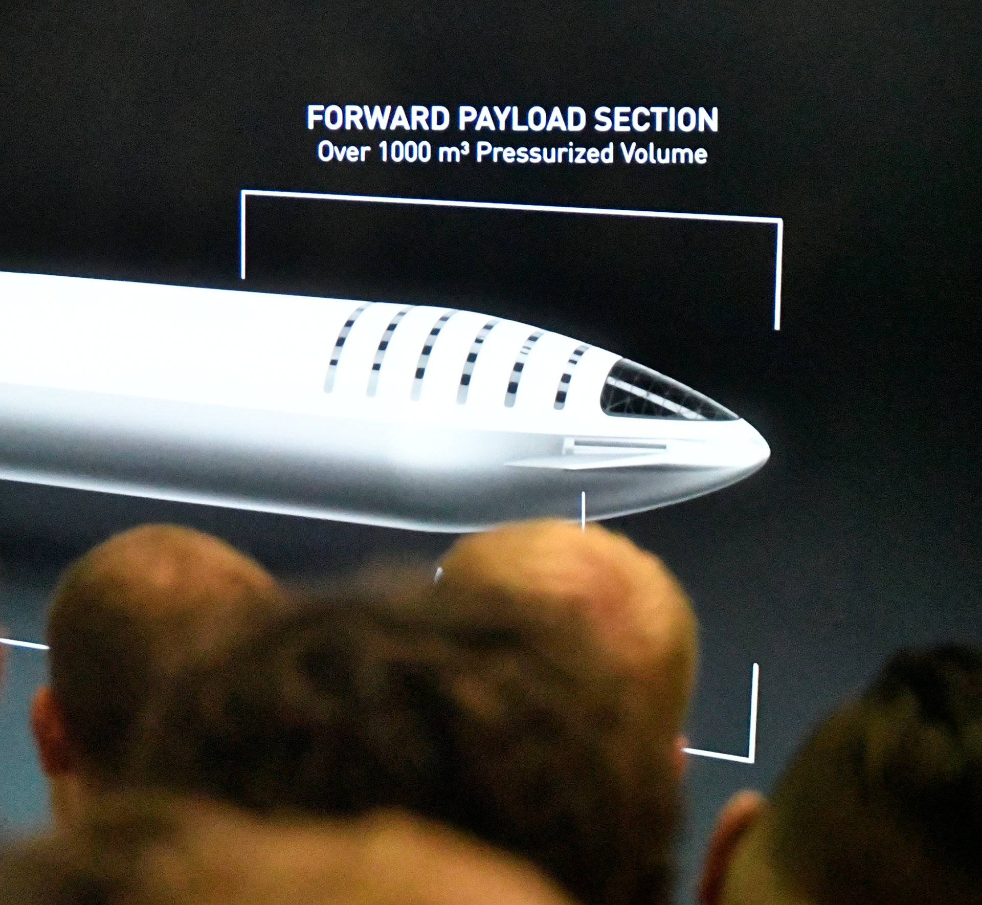 SpaceX CEO Elon Musk shows how the new BFR works during a press conference of the worldâs first private passenger scheduled to fly around the Moon aboard SpaceXâs BFR launch vehicle, at the company's headquarters in Hawthorne