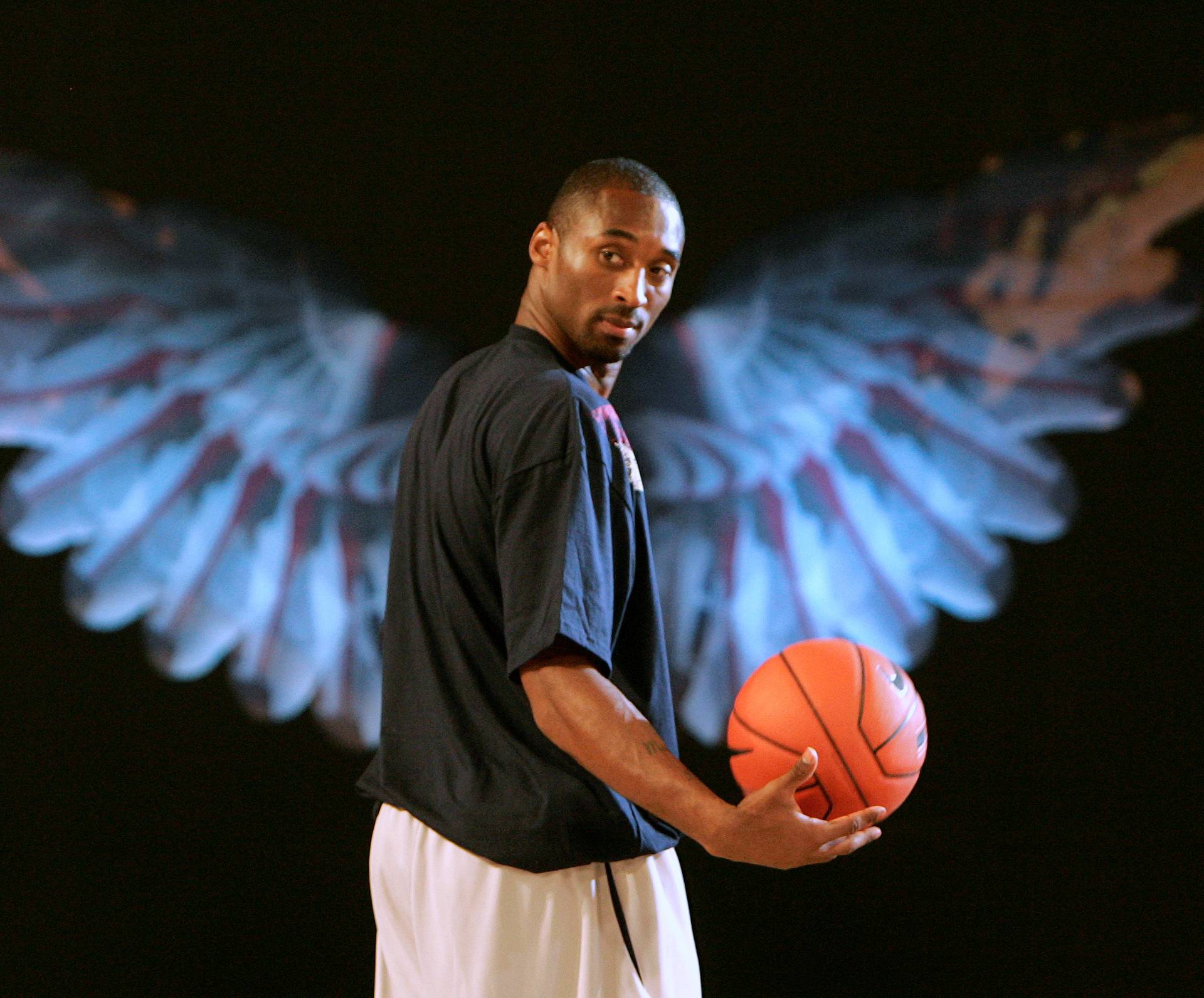 Kobe Bryant of the NBA's Los Angeles Lakers attends a gathering with his fans in Shanghai during his tour of Asia