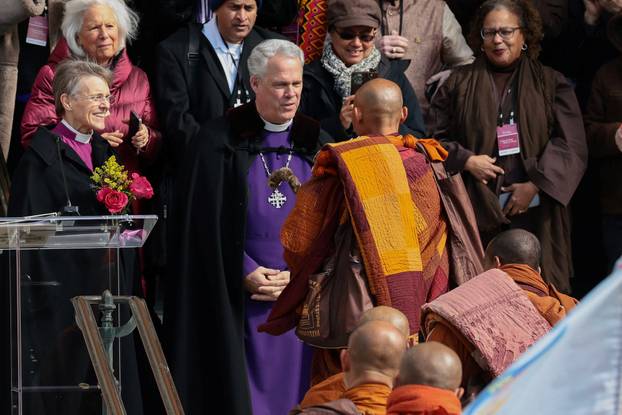 A group of Buddhist monks on the 2,300-mile "Walk for Peace" stand outside the National Cathedral in Washington