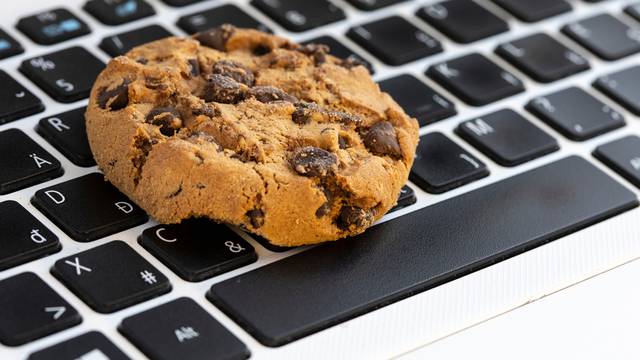 Chocolate,Cake,Cookie,On,Keyboard,Symbol,Of,Internet,Cookies