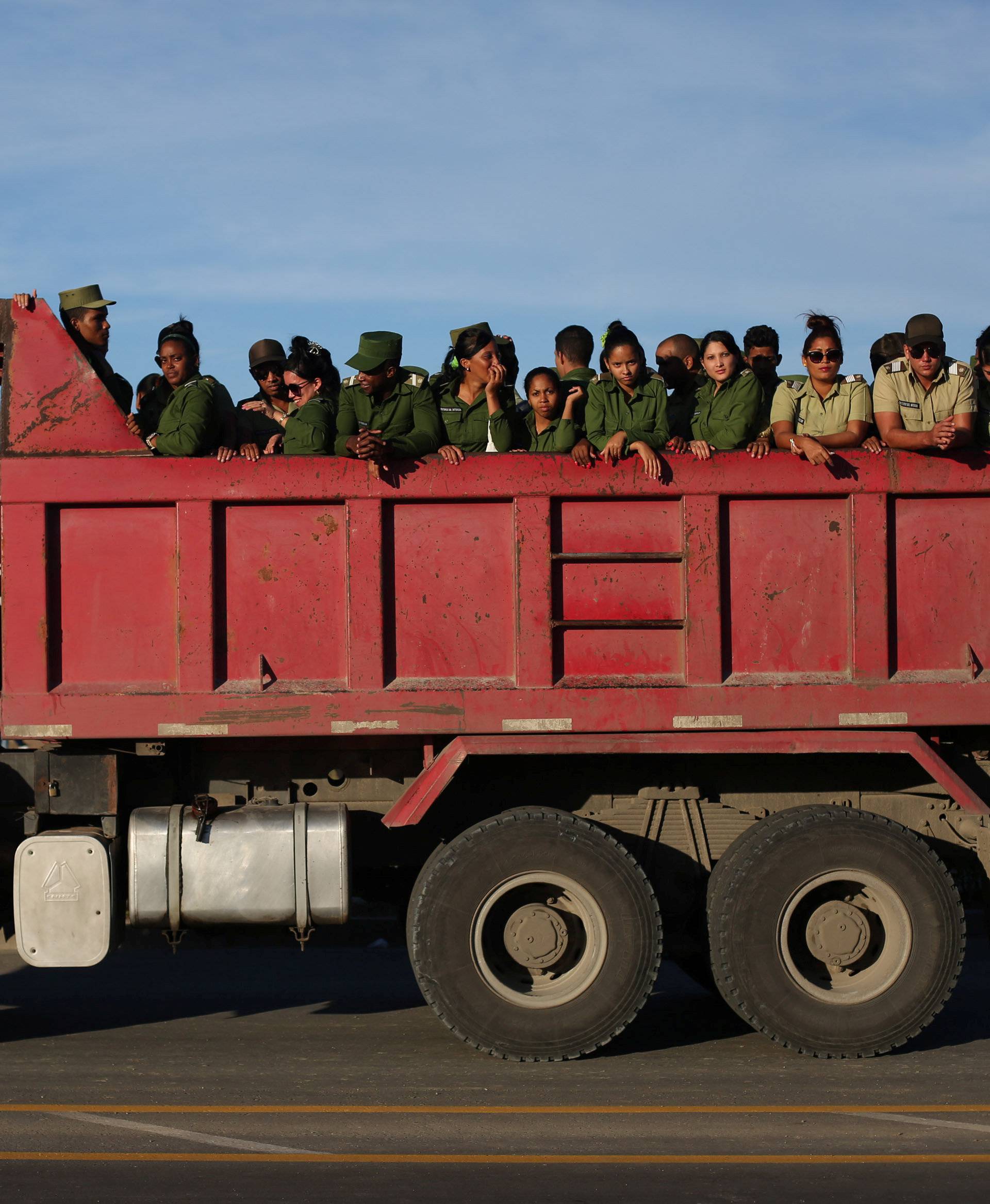 Soldiers are seen after looking at the caravan carrying the ashes of Cuba's late President Fidel Castro toward the Santa Ifigenia cemetery in Santiago de Cuba