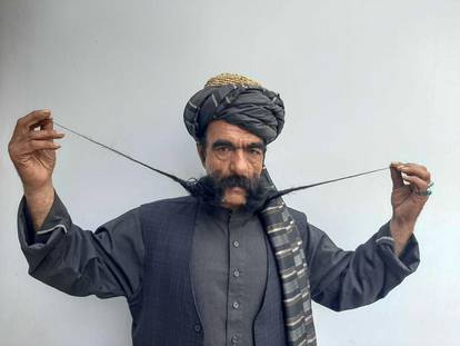 Moustache makes Afghan tailor a celebrity