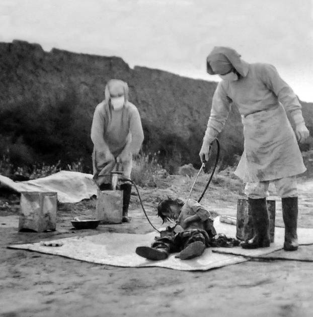 China: Japanese staff conducting an experiment on a live prisoner at Unit 731 in Northeast China (1937-1945) <br/><br/>