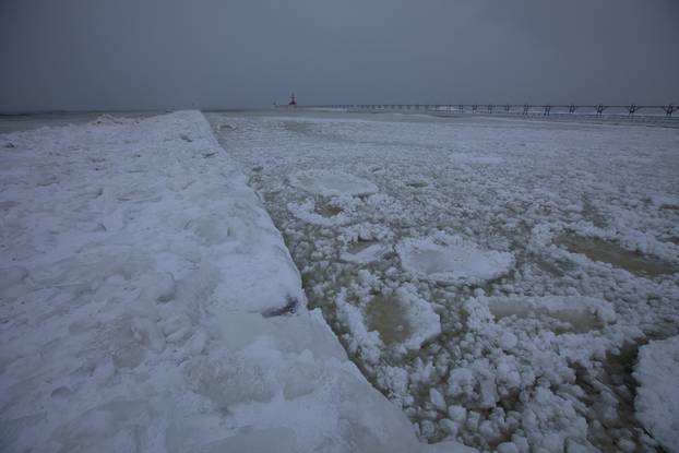 Frozen Lake Michigan is pictured in St. Joseph, Michigan