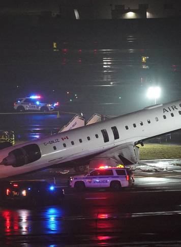 Air Canada Express jet collides with a ground vehicle at LaGuardia airport