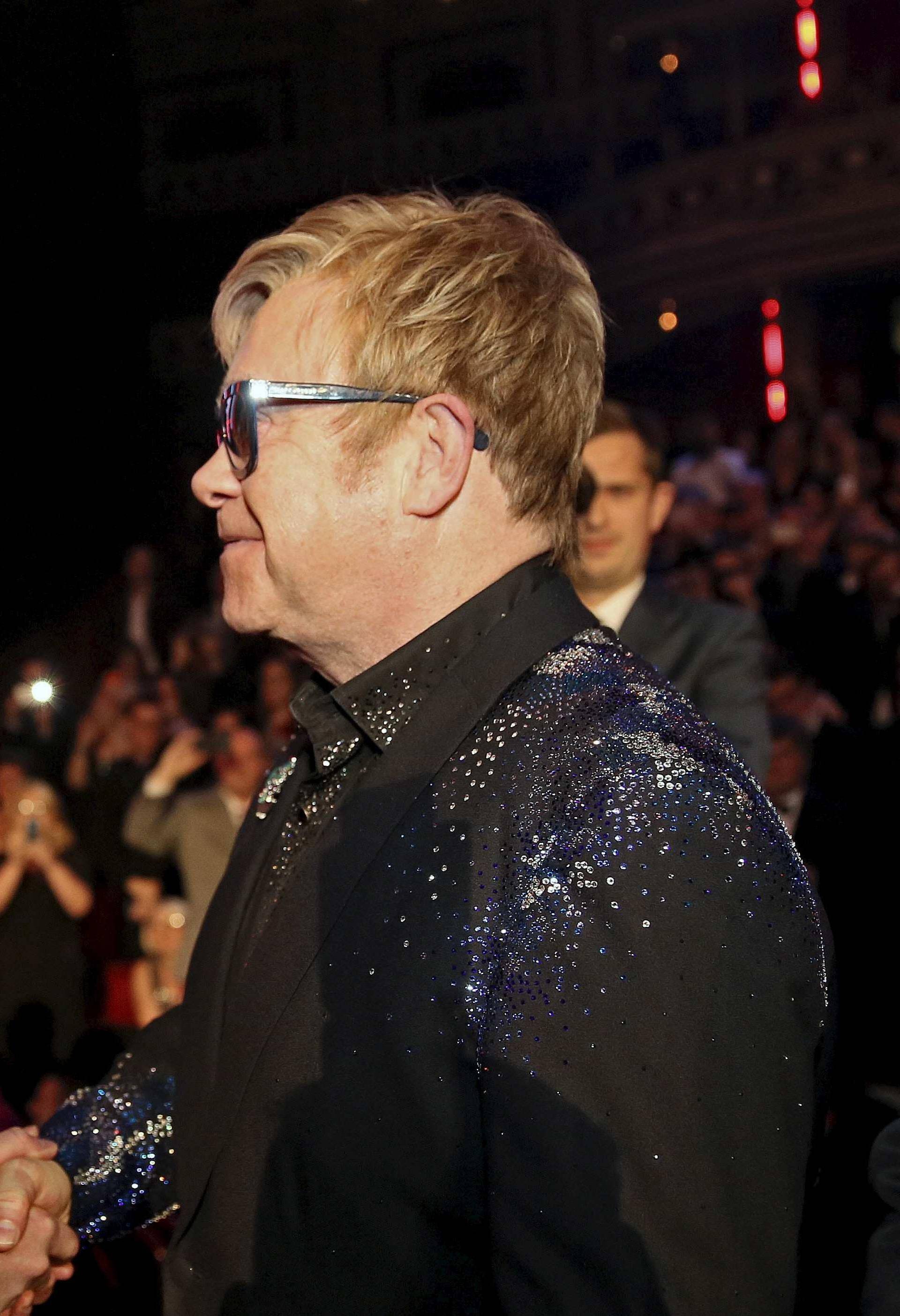 Britain's Prince Harry greets Elton John after the Royal Variety Performance at the Albert Hall in London