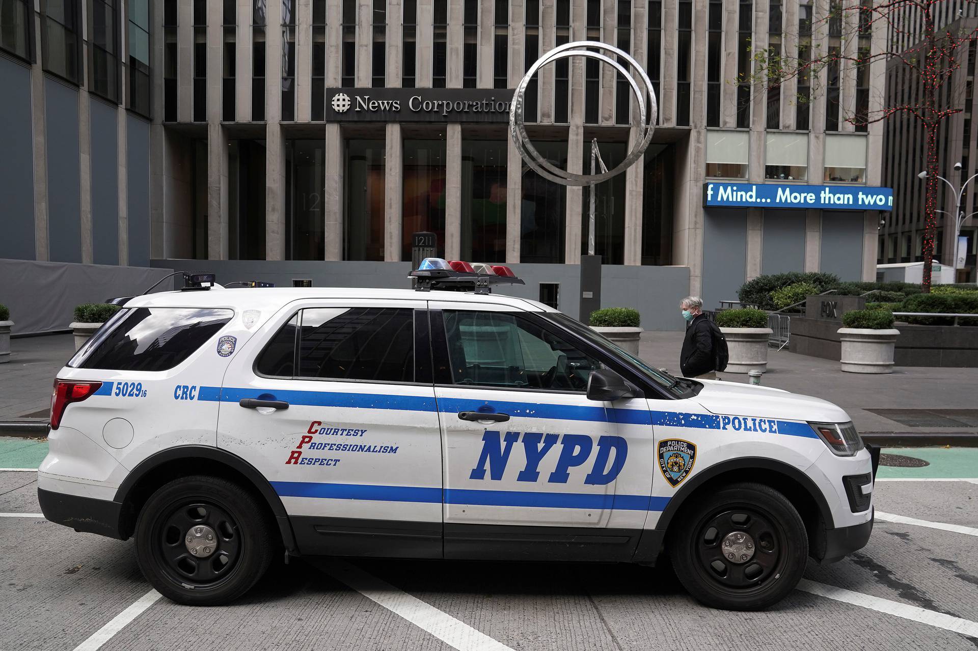A police car is pictured parked outside Fox News headquarters in New York City
