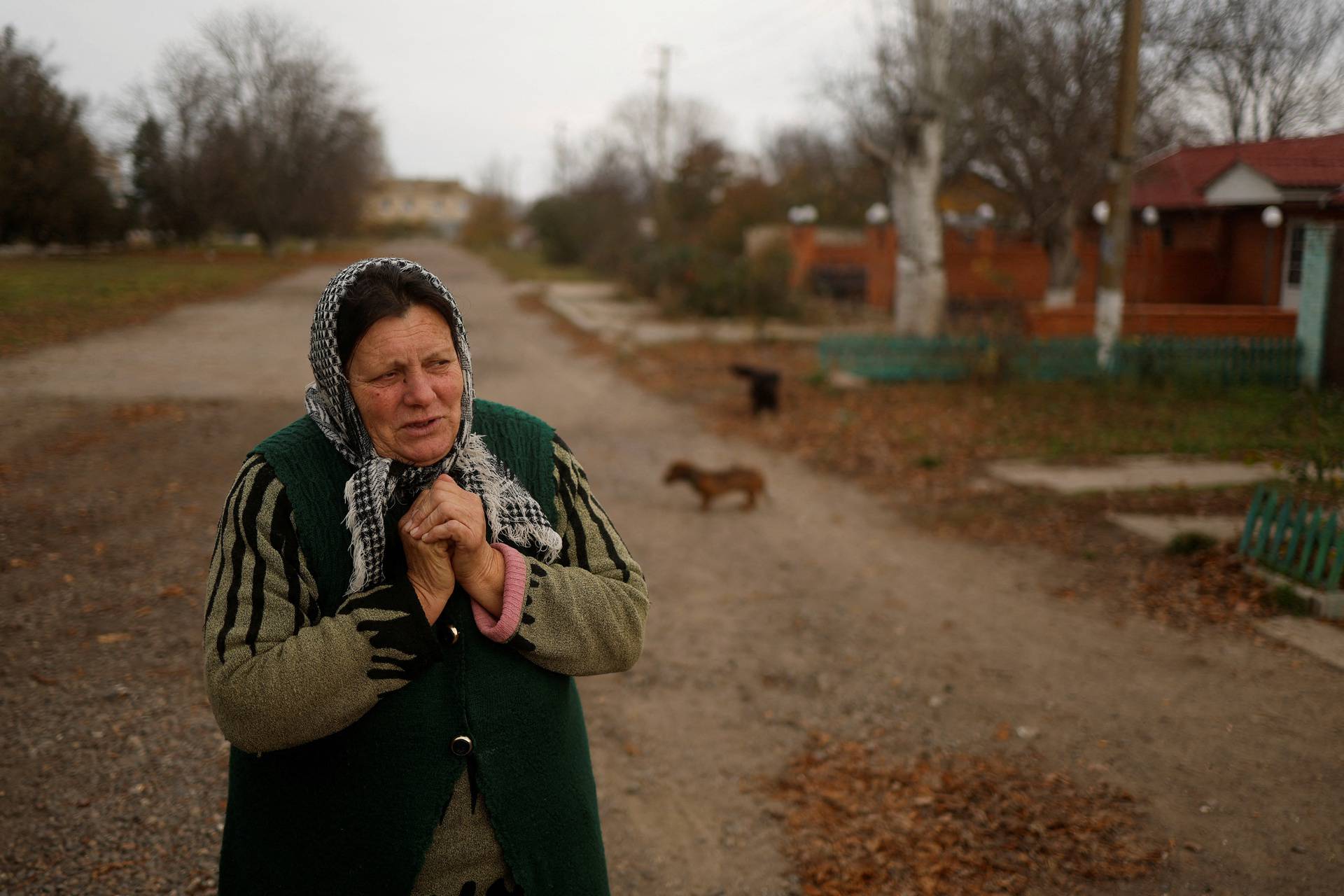 Antonina Ustymenko, 64, reacts as she speaks about Russian occupation in the village of Blahodatne in Kherson region