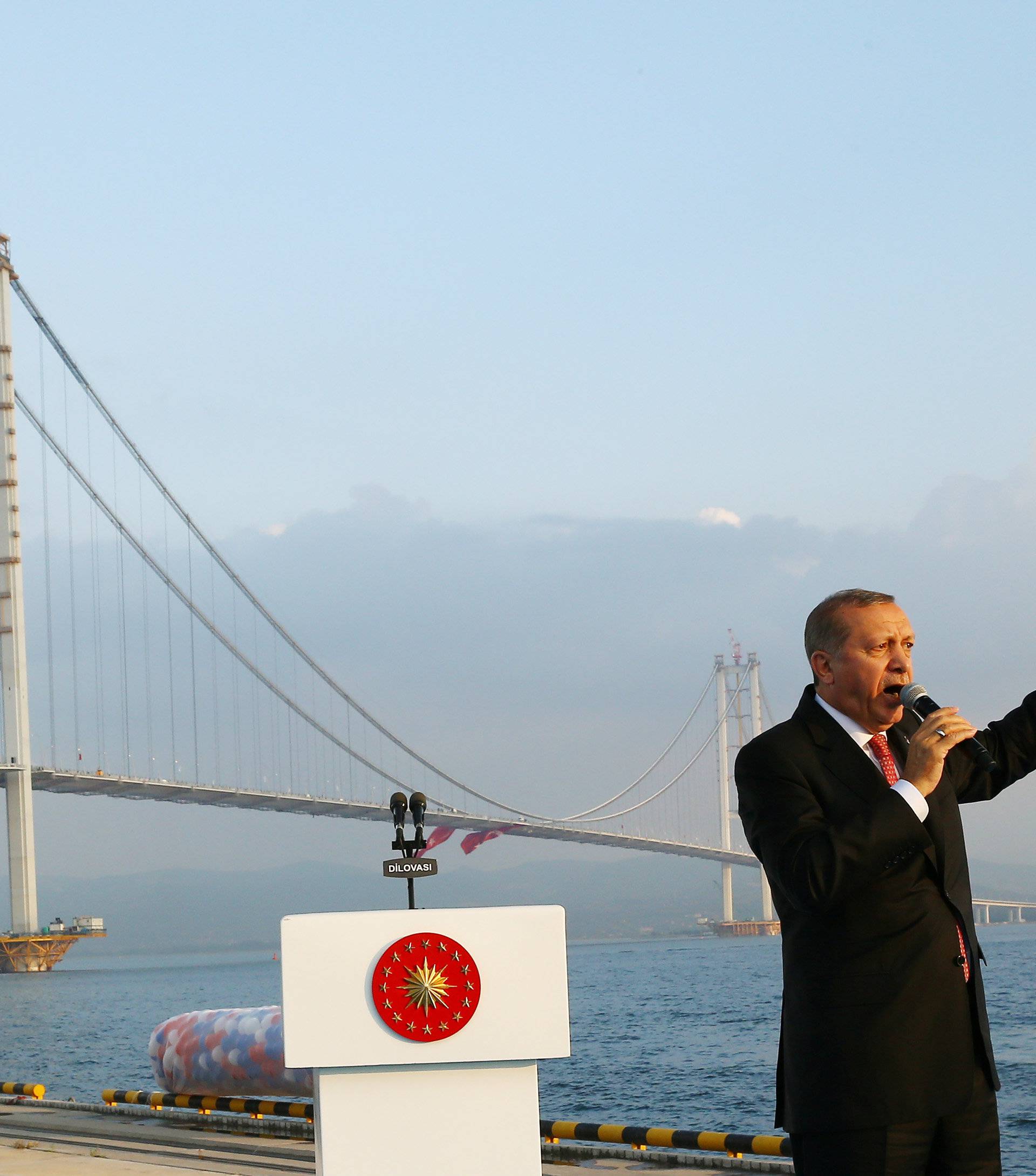 Turkish President Erdogan makes a speech during the opening ceremony of Osman Gazi bridge in Kocaeli