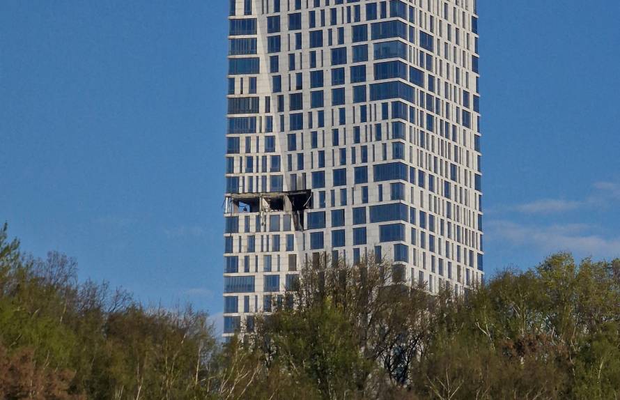 The damaged facade of a high-rise building following a drone attack, amid the Russia-Ukraine conflict, in Moscow
