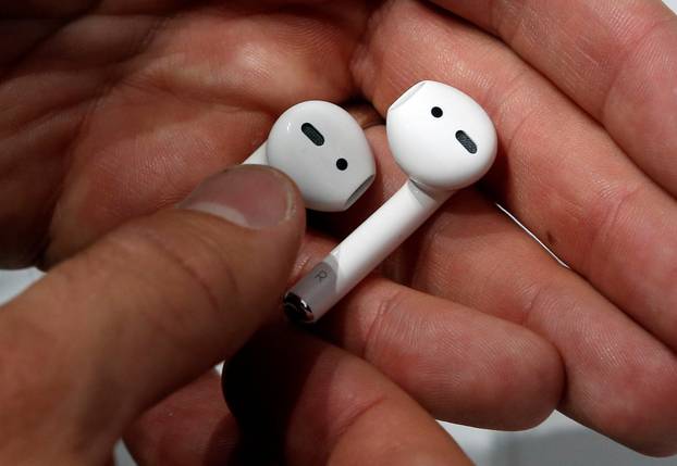 Apple AirPods are displayed during a media event in San Francisco