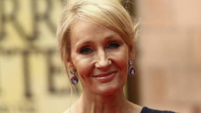 Author J.K. Rowling poses for photographers at a gala performance of the play Harry Potter and the Cursed Child parts One and Two in London