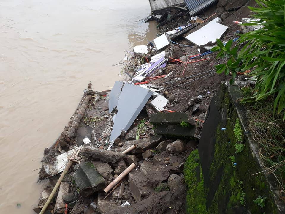Debris from a house that was destroyed after a tropical depression descended upon Daet, Camarines Norte