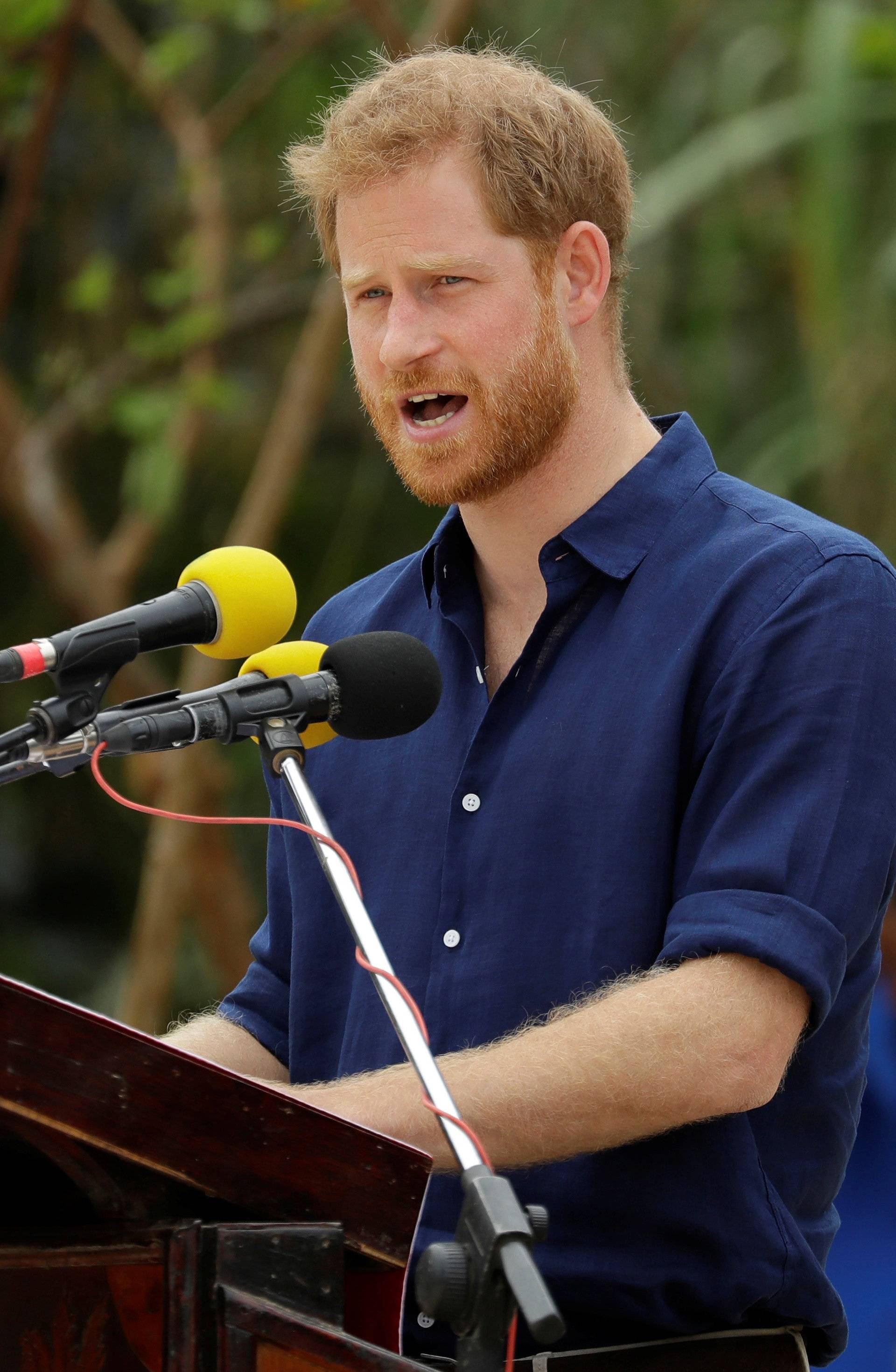 Britain's Prince Harry gives a speech during a visit to Tupou College in Tonga, Friday,