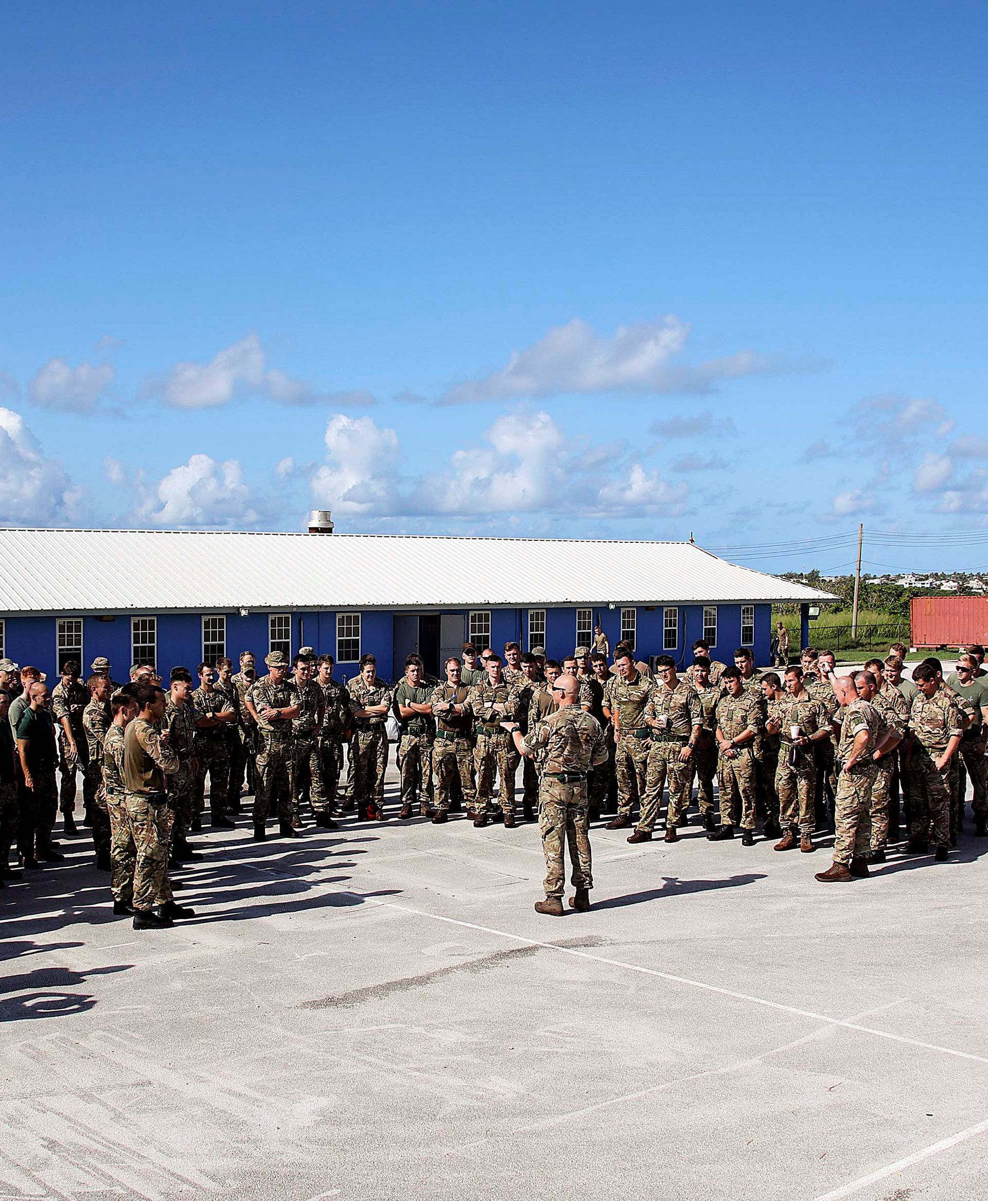Members of Alpha Company, 40 Commando Royal Marines, are briefed in Barbados before traveling to the British Virgin Islands to help provide humanitarian assistance, in Barbados