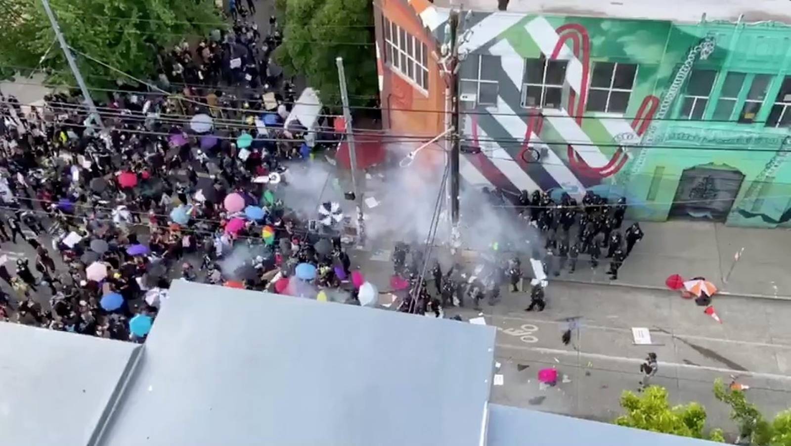 Social media video grab of police clashing with demonstrators during a protest against racial inequality in the aftermath of the death in Minneapolis police custody of George Floyd, in Seattle