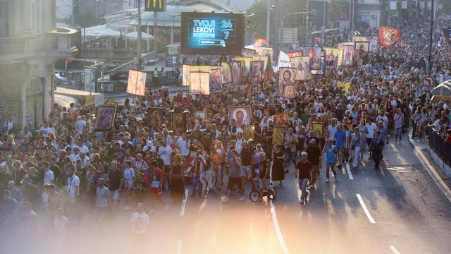 People march during a protest against the international LGBT event Euro Pride in Belgrade