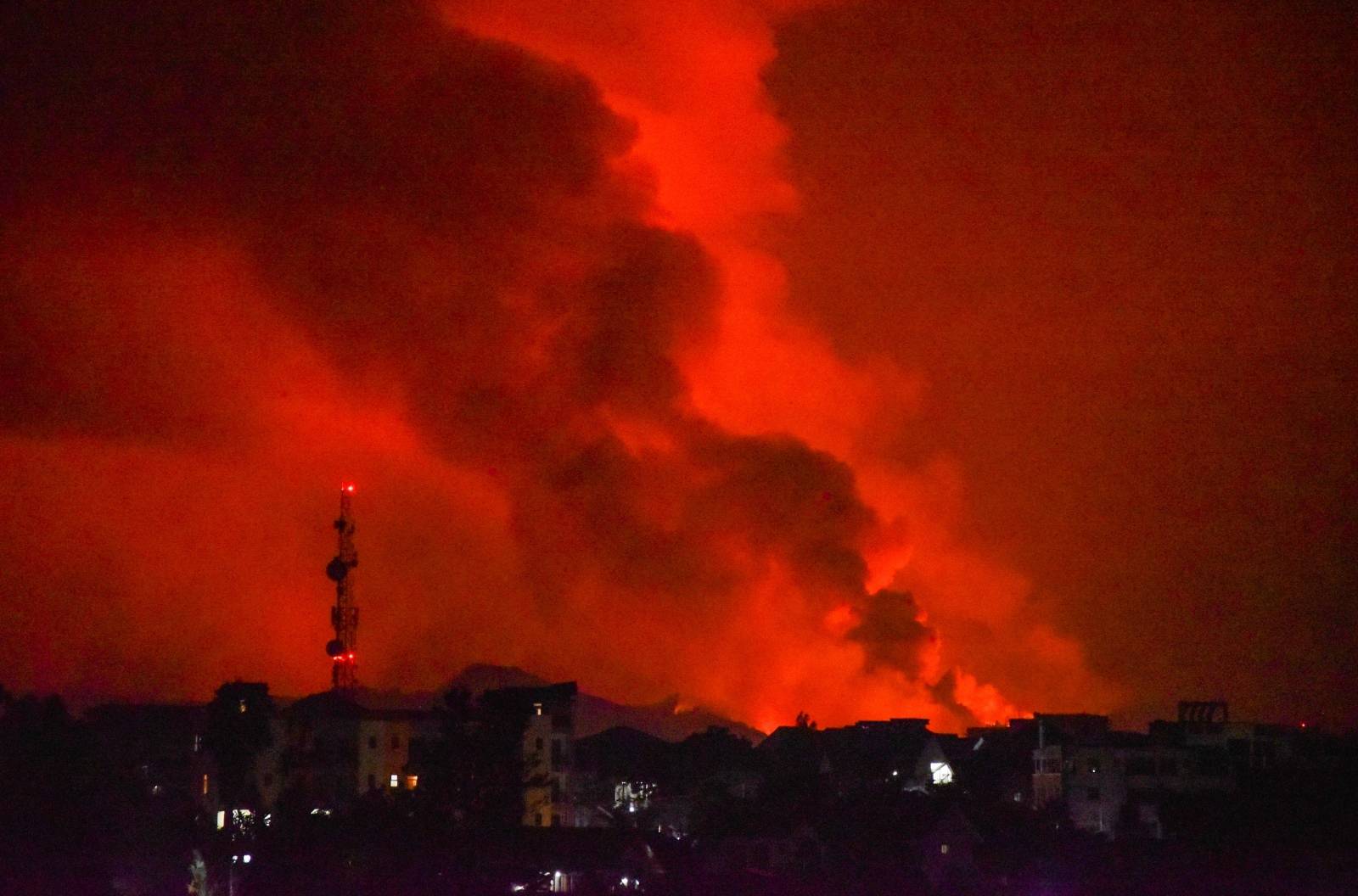 A general view shows smoke and flames at the volcanic eruption of Mount Nyiragongo near Goma