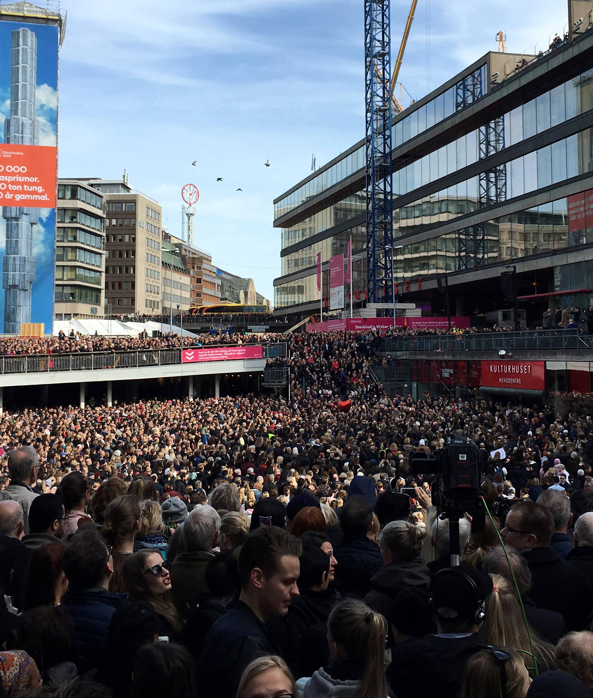 People gather in Sergels torg for a "Lovefest" vigil against terrorism following Friday's attack in Stockholm