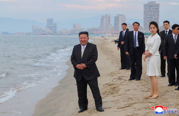 North Korean leader Kim Jong Un and his daughter Kim Ju Ae attend a ceremony to celebrate the completion of the Wonsan Kalma Coastal Tourist Zone