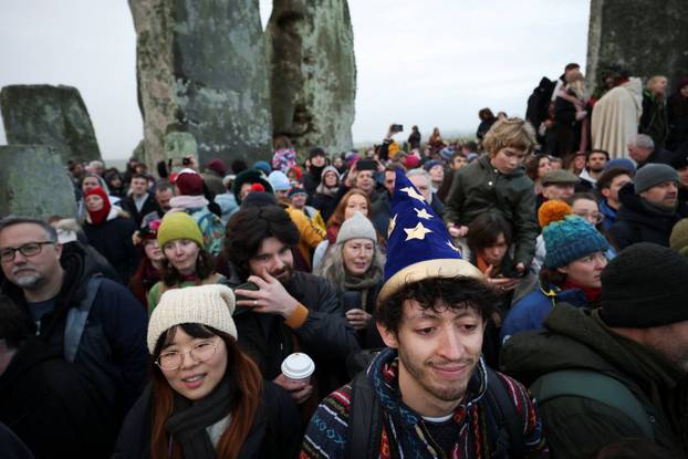 Winter solstice celebrations during sunrise at Stonehenge