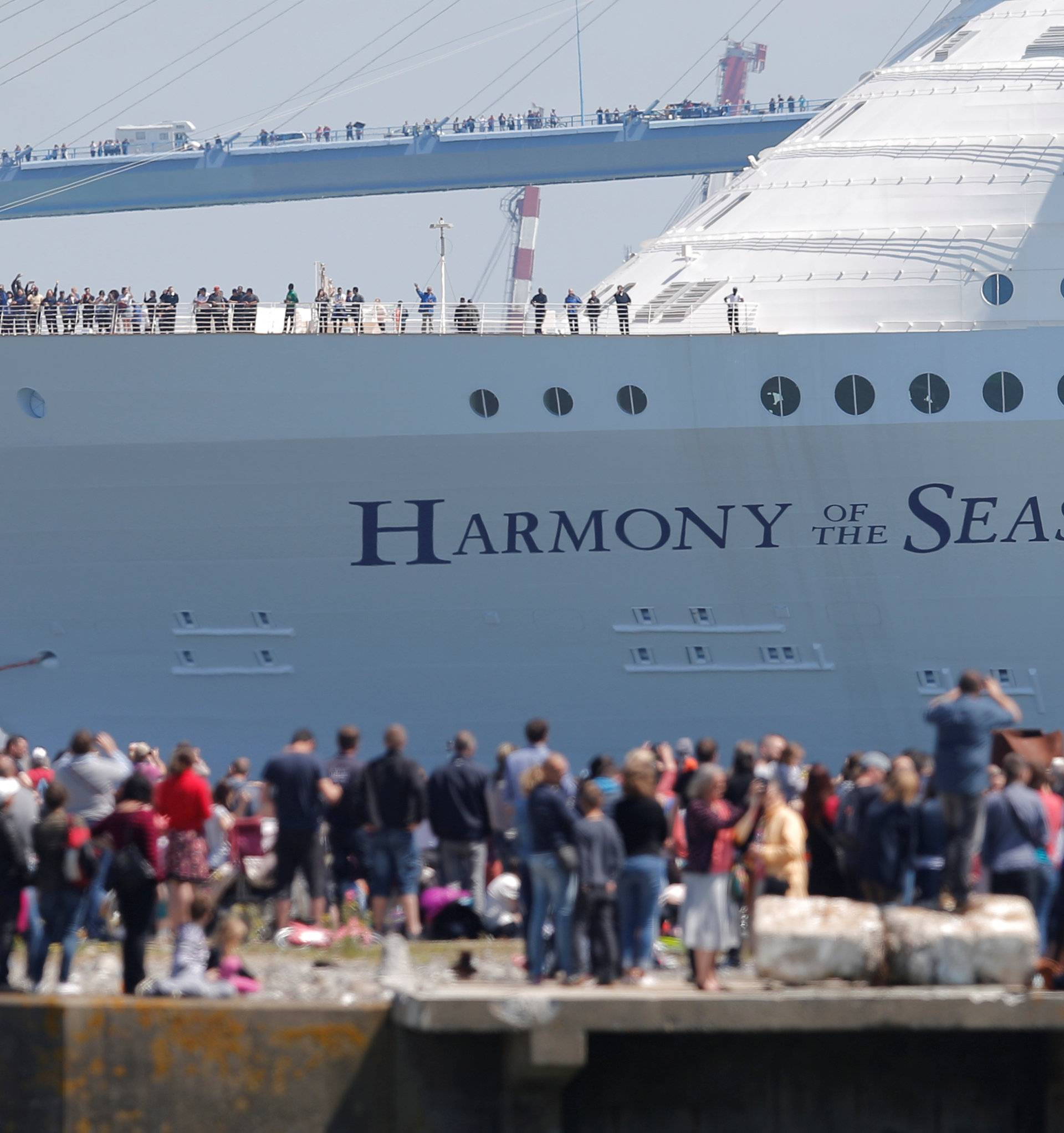 The Harmony of the Seas ( Oasis 3 ) class ship leaves the STX Les Chantiers de l'Atlantique shipyard site in Saint-Nazaire