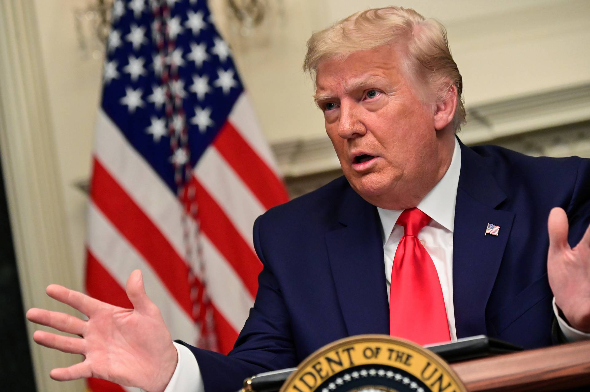 U.S. President Donald Trump participates in a Thanksgiving video teleconference with members of the military forces