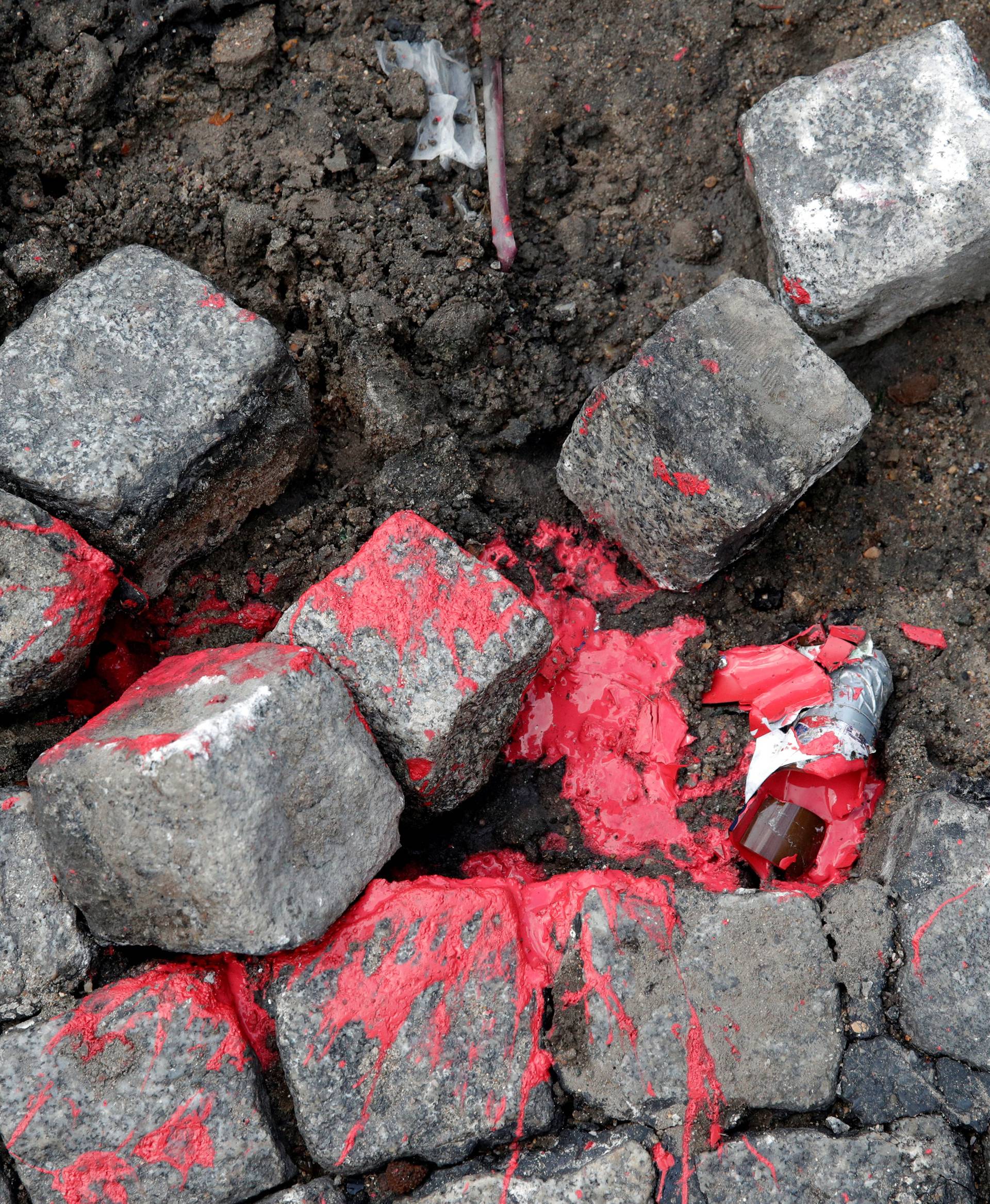 Cobblestones, which were used by masked protesters during clashes with French CRS riot police, are seen at the May Day labour union rally in Paris