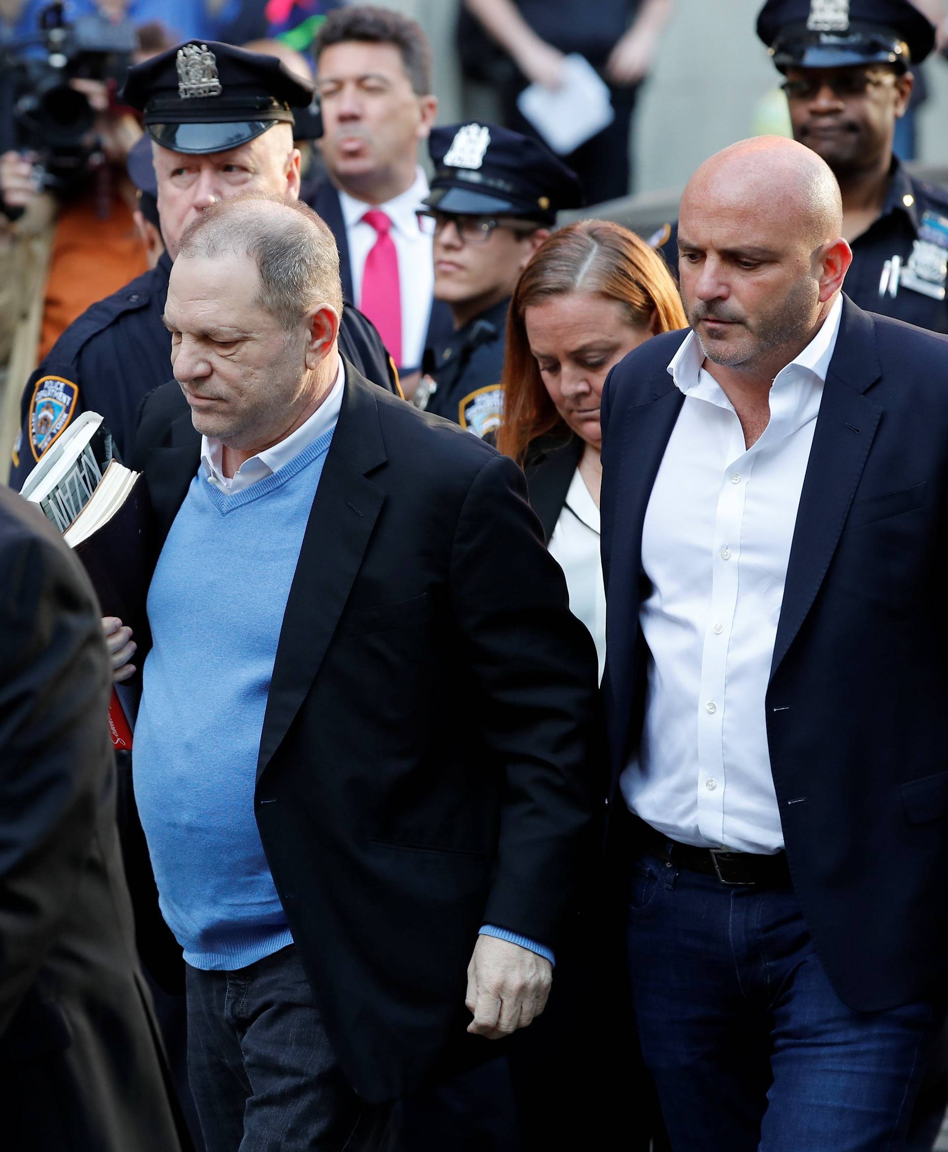 Film producer Harvey Weinstein arrives at the 1st Precinct in Manhattan in New York