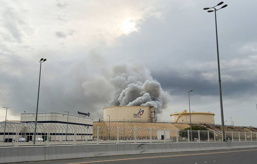 Smoke rises following a strike in Manama