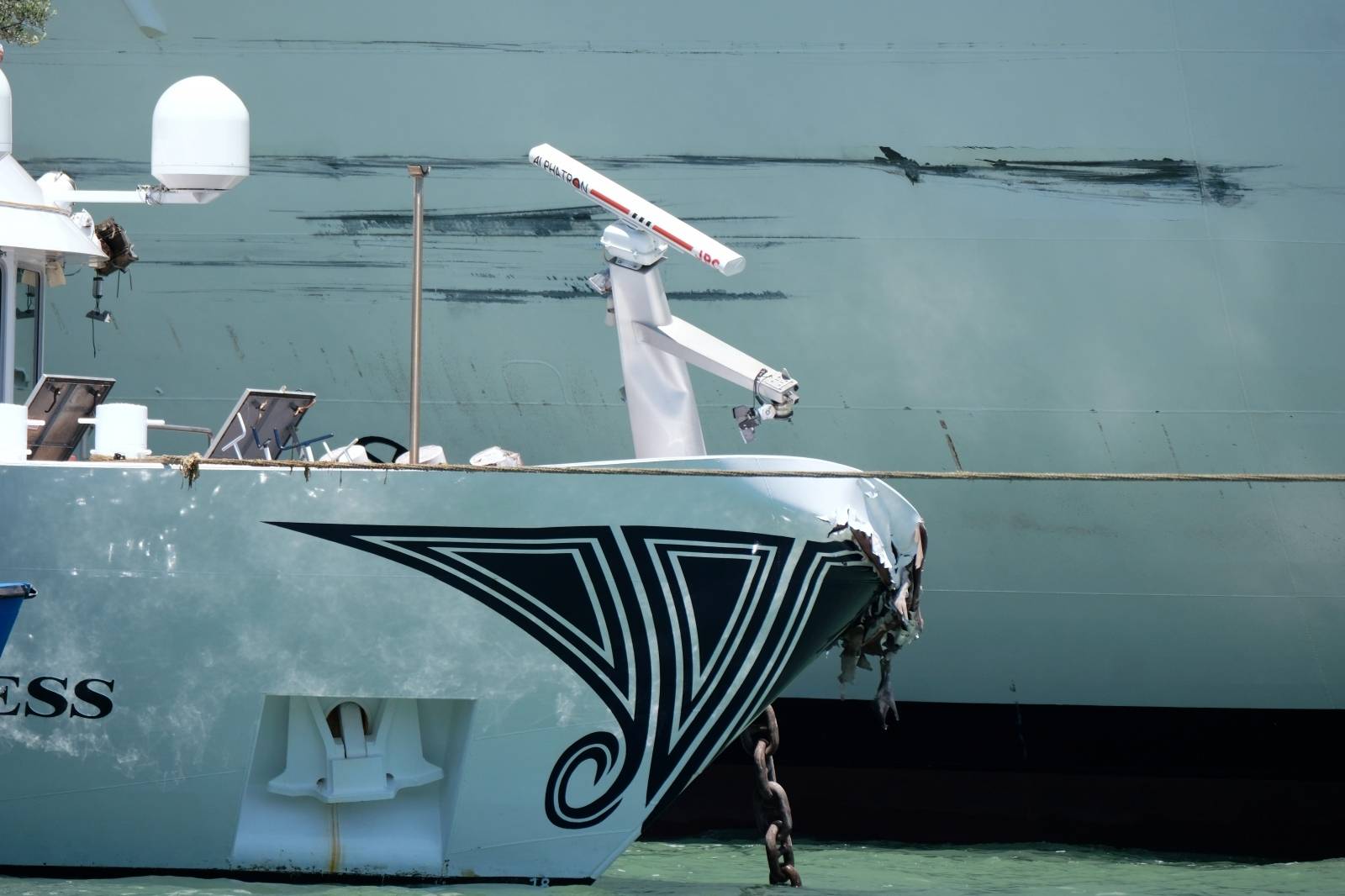 A boat is seen after a crash with MSC Opera at San Basilio dock in Venice