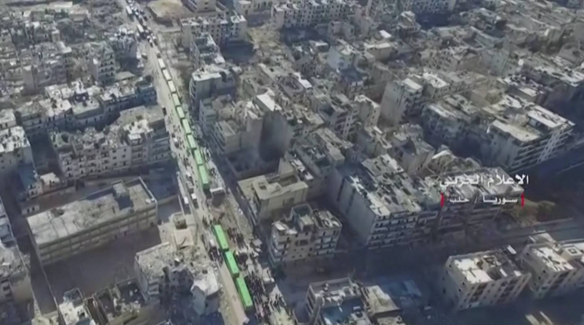 A still image from video taken December 15, 2016 over eastern Aleppo shows an operation to evacuate thousands of civilians and fighters in buses from Aleppo