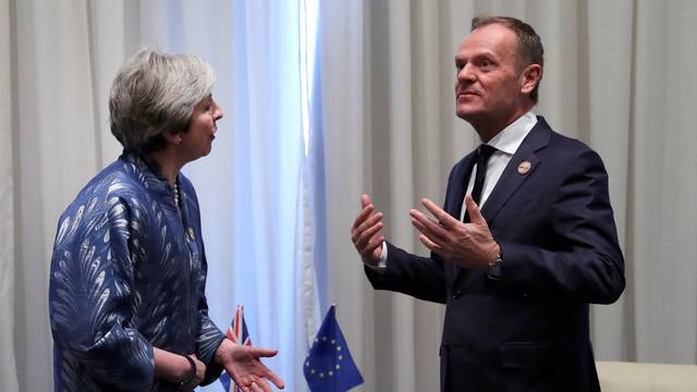 Britain's PM May poses with EU Council President Tusk in the Red Sea resort of Sharm el-Sheikh